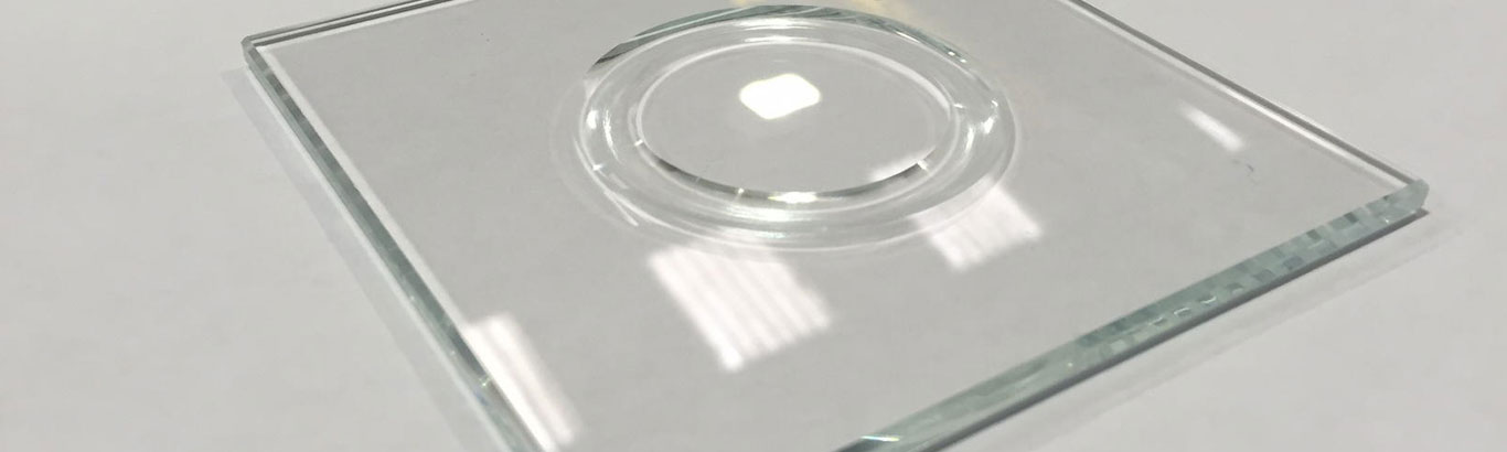 a small piece of 4mm glass with a polished circular groove in the middle